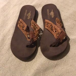 Cute brown rocket dog flip flops